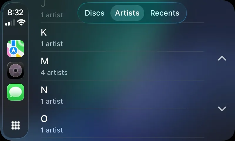 CarPlay Artists tab showing a list of letters, each with a count of artists